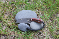 Banzelcroft Customs mini MEK, a custom titanium EDC utility knife with black and red jute handle scales and red liners.