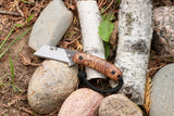 Banzelcroft Customs MEK, a custom titanium EDC utility knife with Japanese elm burl handle scales and canvas micarta liners.