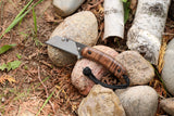 Banzelcroft Customs MEK, a custom titanium EDC utility knife with koa handle scales and canvas micarta liners.
