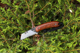 Banzelcroft Customs MEK, a custom titanium EDC utility knife with leopardwood handle scales.