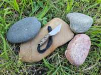 Banzelcroft Customs micro kiridashi, a small EDC fixed blade made from magnacut steel with mokume-gane handle scales.