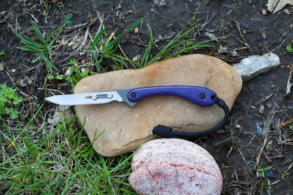 Banzelcroft Customs MEK, a custom titanium EDC utility knife with purple G10 handle scales.