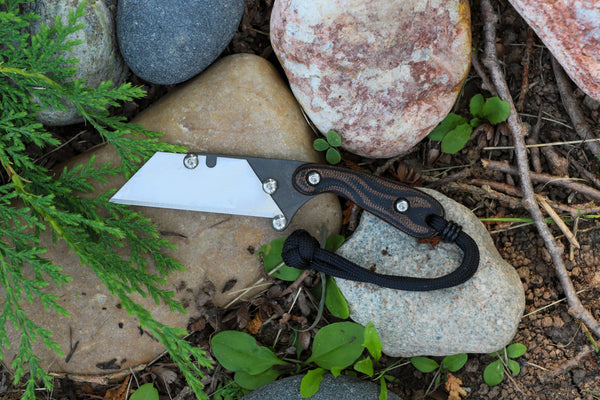 Banzelcroft Customs mini MEK, titanium EDC utility knife with python canvas micarta handle scales.