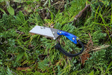 Banzelcroft Customs MEK, a custom titanium EDC knife with royal blue kirinte handle scales.