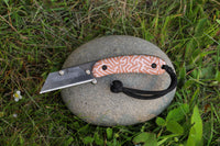 Banzelcroft Customs MEK, a custom titanium EDC utility knife with sand ripples crazy fiber handle scales.
