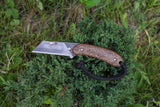 Banzelcroft Customs MEK, a custom titanium EDC utility knife with coconut husk micarta handle scales and natural canvas micarta liners.