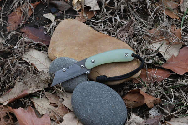 Banzelcroft Customs MEK, a titanium EDC utility knife with jade ghost G10 handle scales.