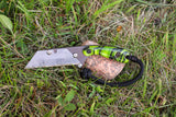 Banzelcroft Customs MEK, a custom titanium EDC utility knife with toxic green kirinite handle scales.