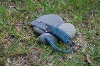 Banzelcroft Customs MEK, a Titanium EDC utility knife with turquoise diamond paracord handle wrap.