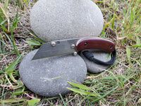 Banzelcroft Customs MEK, a custom titanium EDC utility knife with vintage Westinghouse red linen and copper handle scales.