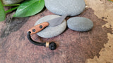 Banzelcroft Customs micro kiridashi with natural canvas handle scales and bronze bead.