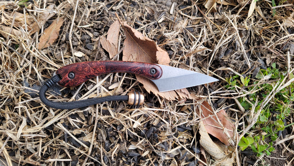 Banzelcroft Customs kiridashi with old growth honduran rosewood, vintage westinghouse liners, and bronze bead.